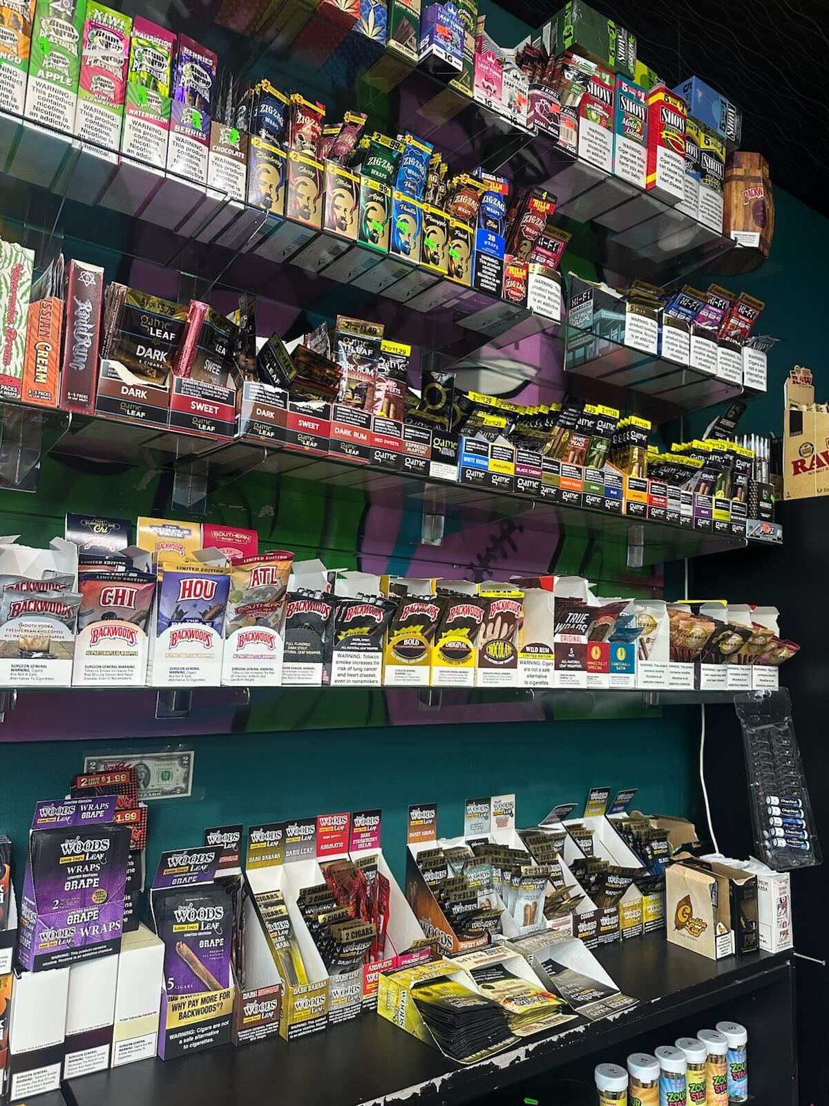 Shelves filled with colorful cigarette and tobacco product packaging