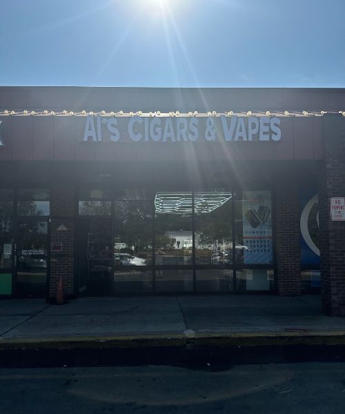 The front of a cigar and vapes store