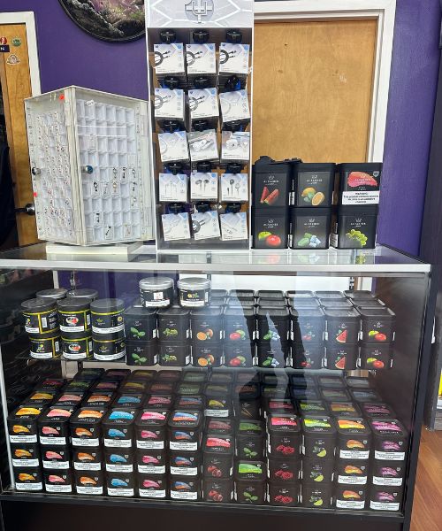 A display case filled with lots of different flavored items